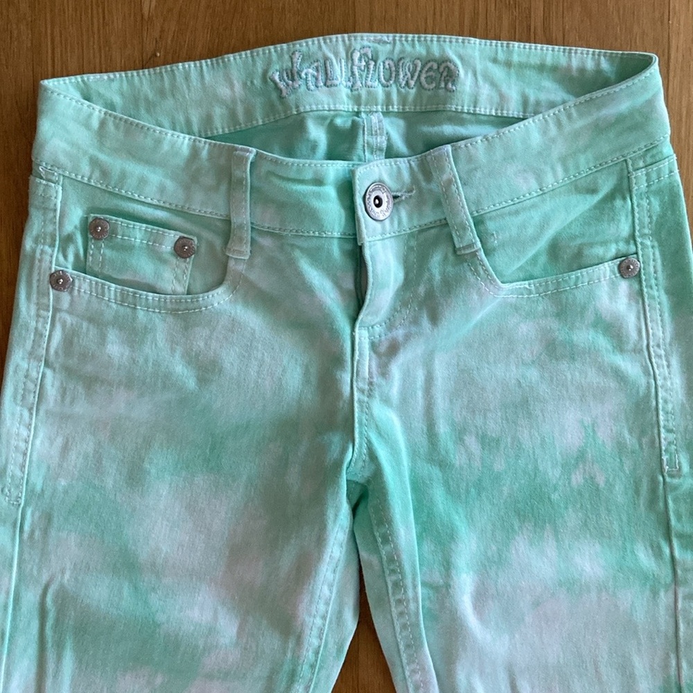 Wallflower Tie Dye Raw Edge Jeans.